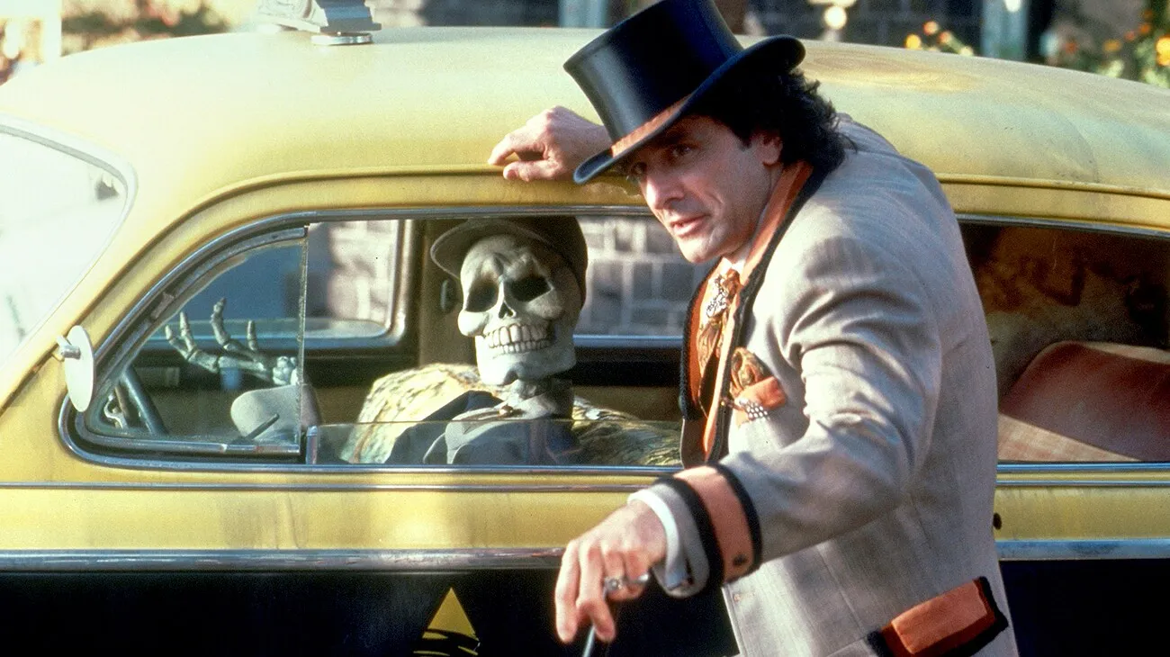 A man in a top hat leans beside a yellow taxi, with a skeleton at the wheel.