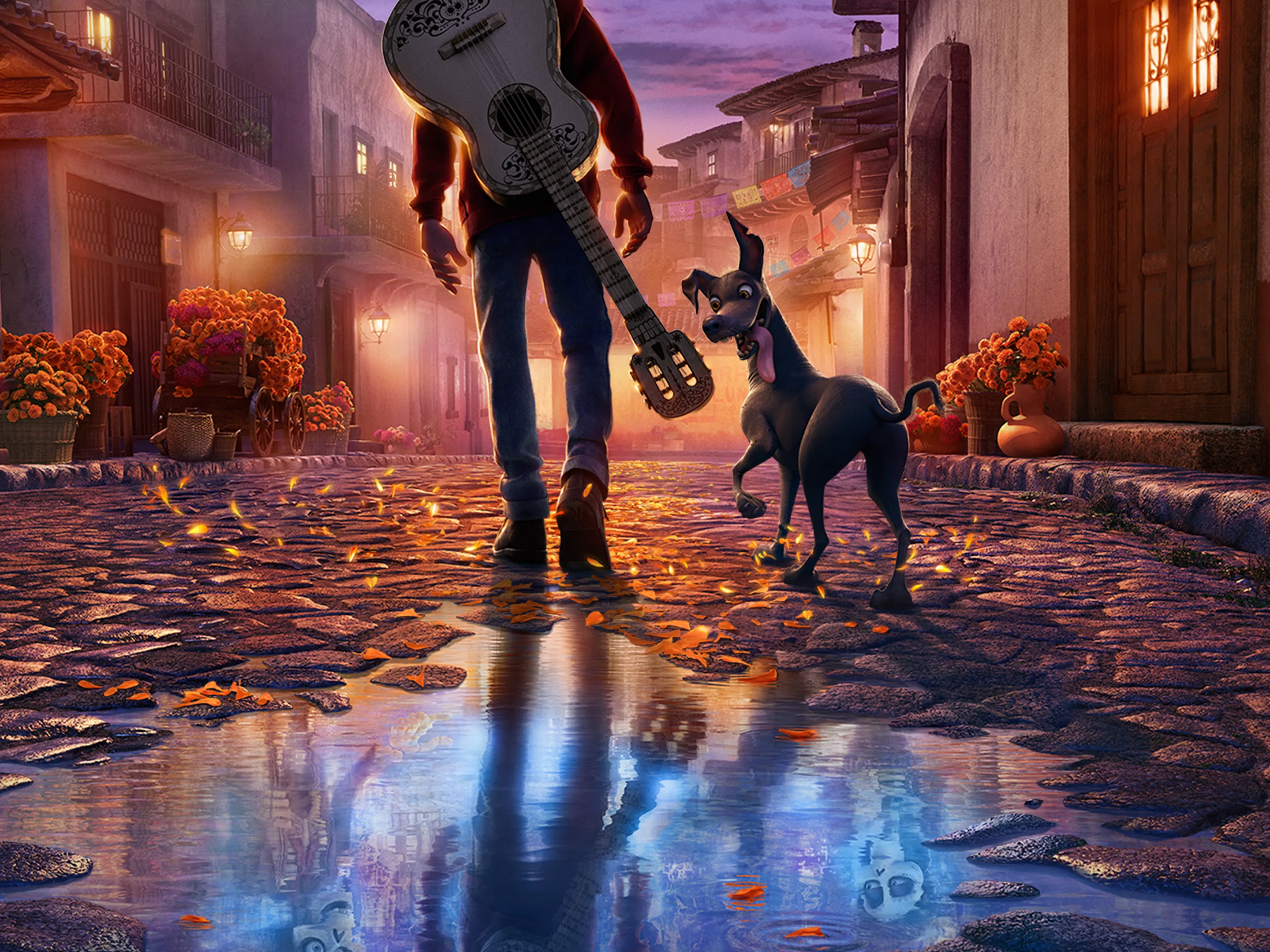 Miguel stands with a white guitar while Dante looks back on a wet cobblestone street lined with marigolds at twilight in Disney/Pixar's Coco.
