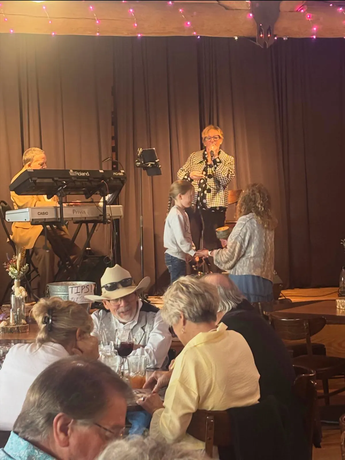 Guests dining inside The Timbers Steaks & Spirits.