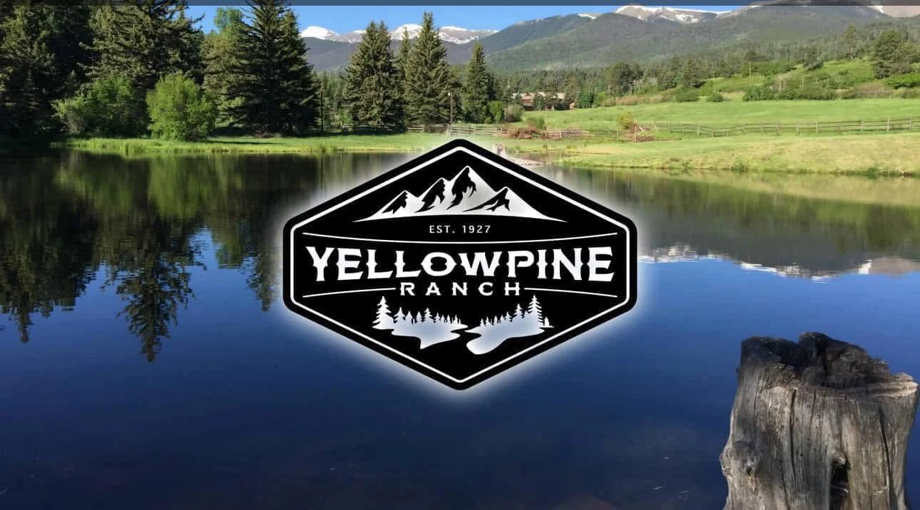 Yellow Pine Ranch logo over a mountain lake.