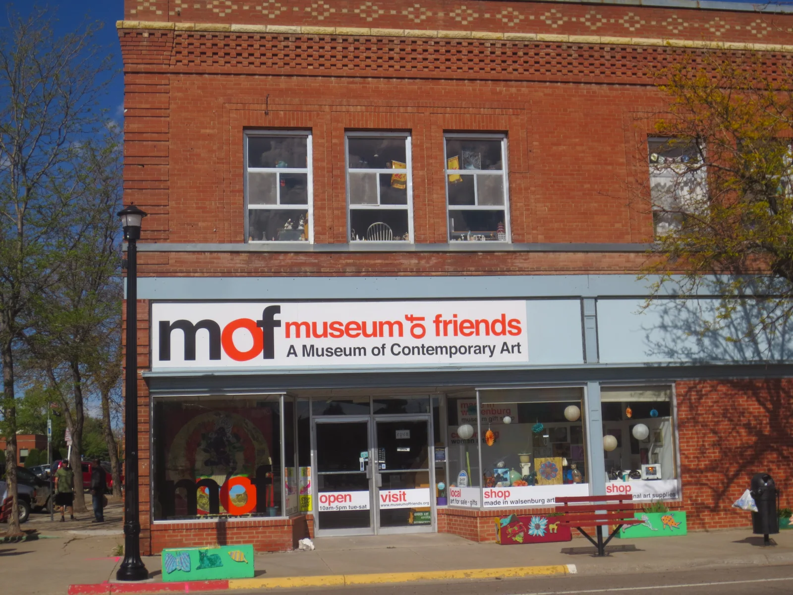 Museum of Friends storefront and sign at 109 E 6th Street in Walsenburg.