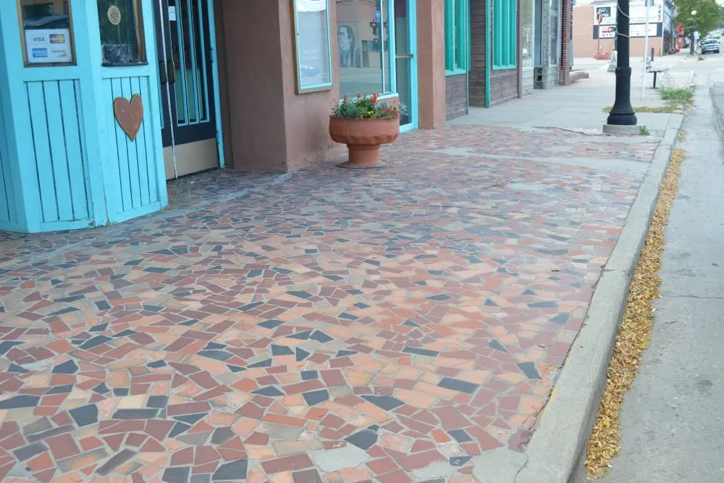 Main Street sidewalk and theatre entrance documented during the assessment.
