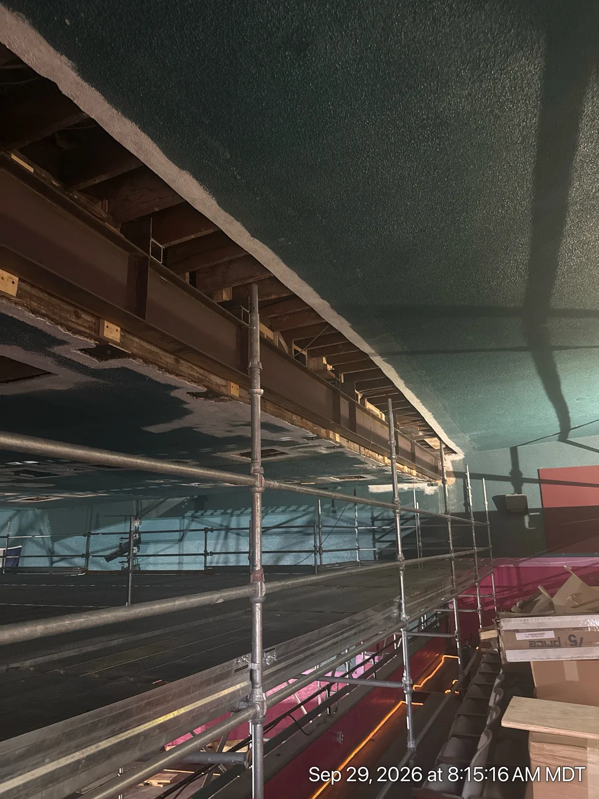 A long reinforced beam above scaffolding in the balcony work area at Fox Walsenburg on September 29, 2026.