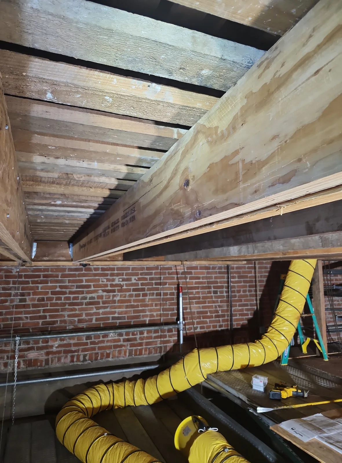 New timber reinforcement beside the Fox’s historic brickwork.